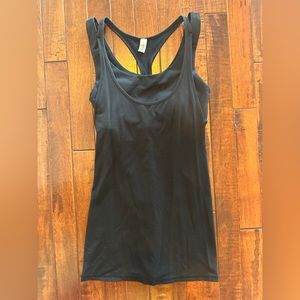 Gently worn, black lululemon athletic tank top with built in bra